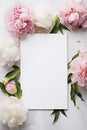 Vertical wedding stationery mock up scene. White blank paper for invitations and greeting card with peonies flowers composition Royalty Free Stock Photo