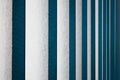 Vertical white wooden blinds