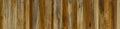 Vertical wooden planks showing rich grain creating natural textured background