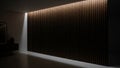 Vertical wooden slats illuminated by soft light in a dark modern room Royalty Free Stock Photo
