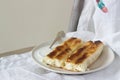 Vertuta or placinta with cottage cheese and cheese with sour cream. Traditional Moldovan, Romanian or Balkan pie.