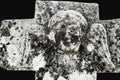 Very ancient statue of an stone angel with dark background
