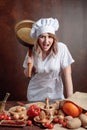 Very angry chef with big frying pan in hand Royalty Free Stock Photo