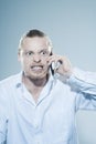 Very angry man on telepone Royalty Free Stock Photo