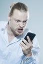 Very angry man on telepone Royalty Free Stock Photo