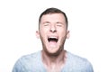 Very angry young man screaming Royalty Free Stock Photo