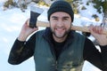 Very attractive lumberjack in the snow Royalty Free Stock Photo