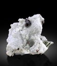 very beautiful almandine garnet with albite and muscovite Mineral specimen from skardu pakistan Royalty Free Stock Photo