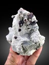 very beautiful almandine garnet with albite and muscovite Mineral specimen from skardu pakistan Royalty Free Stock Photo