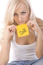 Very beautiful blonde holding a yellow sticker tha