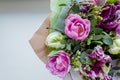 Very beautiful colorful blossoming flower bouquet of fresh Quicksand roses, carnations, ranunculus, peony, branches with Royalty Free Stock Photo