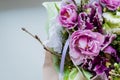 Very beautiful colorful blossoming flower bouquet of fresh Quicksand roses, carnations, ranunculus, peony, branches with Royalty Free Stock Photo