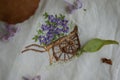 A very beautiful handkerchief with embroidery a cart with flowers Royalty Free Stock Photo