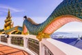 A very beautiful Naga a very great serpent statue surrounding the pagoda at Doi Thepnimit temple on Patong hilltop Royalty Free Stock Photo