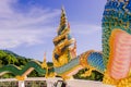 A very beautiful Naga a very great serpent statue surrounding the pagoda at Doi Thepnimit temple on Patong hilltop