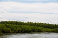 Very beautiful natural landscape in Ukraine. Sky, water and forest in summer or spring. Desna river in the city of Chernihiv Royalty Free Stock Photo