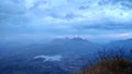 A perfect combination of beauty of nature , hills covered by clouds , sunset view.