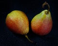 Very beautiful ripe pear on a black background Royalty Free Stock Photo