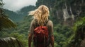 A very beautiful, sensual, blond 24-year-old woman against a jungle background, with backpack, back view