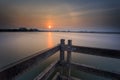 A very beautiful sunset seen from one of the bridges on Ancol beach Royalty Free Stock Photo