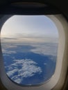 View of the clouds and sky from inside a plane in Jakarta, Indonesia Royalty Free Stock Photo