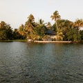 Attractive silent water river house and trees in kerala