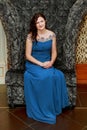 Very beautiful woman smiling sitting on a chair Royalty Free Stock Photo