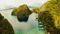 Very beautyful lagoon with boats. Paradise islands in Philippines. Kayangan Lake. Fisheye view. Royalty Free Stock Photo