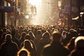 A very busy street with people at sunset. Oncoming sun.