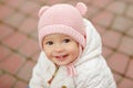 Very charming beautiful little girl with big brown eyes in a pin Royalty Free Stock Photo