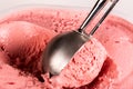 Creative angle for some strawberry ice cream being scooped out Royalty Free Stock Photo