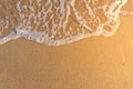 Very close sand beach and wave in Greece, burning sun Royalty Free Stock Photo