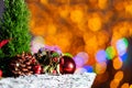 A close-up view of a Christmas reed during the ongoing Christmas season and the flickering bokeh of Christmas tree Royalty Free Stock Photo