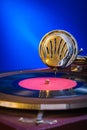 Very close up view on gramophone on blue background Royalty Free Stock Photo