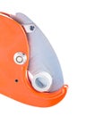 Very close up view on pipe cutter with plastical pipe isolated Royalty Free Stock Photo
