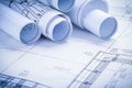 Very close up view on rolled blueprints Royalty Free Stock Photo