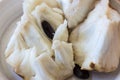 Very close view of broken apart hunks of cherimoya fruit Annona cherimola with seeds revealed Royalty Free Stock Photo