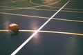 Very colorful basketball court with basketball ball