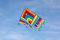 very colorful kite flying on the blue sky Royalty Free Stock Photo