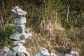 Very complicated balance stone tower on a stone fence. Concept concentration, passionate, stamina. Nature background Royalty Free Stock Photo