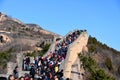 Very crowded Great Wall of China on a sunny day