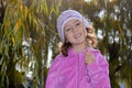 Very cute little girl in a pink blouse