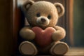 Cute teddy bear holding a red heart. Valentine`s day background Royalty Free Stock Photo