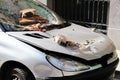Very damaged car, crashed, parked