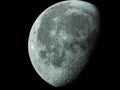 very dense close-up of a decreasing moon in the night sky