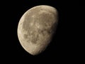 very dense close-up of a decreasing moon in the night sky