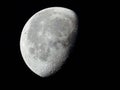 very dense close-up of a decreasing moon in the night sky