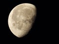 very dense close-up of a decreasing moon in the night sky