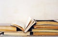 Very dirty discarded books, one book opened Royalty Free Stock Photo