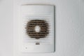 Very dirty and dusty white plastic ventilation grill. Ventilation shaft in the apartment. dirty air filter. Royalty Free Stock Photo